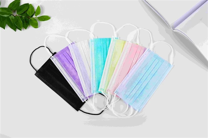 Single disposable mask sealed in a transparent PE bag